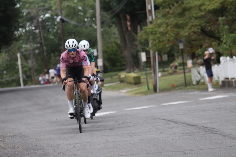 Tour de Florissant 2025 G -LXXXXVIII.jpg :: Tour de Florissant 2025/Gateway Cup 2025 - Men's Pro Cycling CAT I - September 1st 2025 - Tour de Florissant - New course for 2025! The fourth and final leg of the Gateway Cup gets underway in Historic Old Town Florissant in St. Louis County. This technical course races through one of St. Louis' most nostalgic locales. Note - the course has been shifted to a flat finish in front of Historic City Hall, one mild climb, 6 turns. (Gateway Cup website) In mass start cycling races, the winner is determined by the first rider to cross the finish line. However, the race format can vary, and some events may have additional criteria or rules that can influence the winner. For example, in points races, the rider with the most points at the end of the race wins, and in sprint events, the winner is determined by the third rider to cross the finish line after a series of sprints. (Wikipedia) USA Cycling