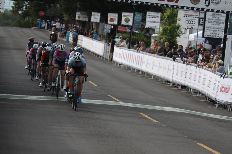 Tour de Florissant 2025 G -XV.jpg :: Tour de Florissant 2025 - Gateway Cup 2025 - September 1st 2025 -Labor Day Weekend 2025 - Labor Day - Women's Pro CAT 1/2 - 70 minutes of racing, a field of 150 bicycle racers - Tour de Florissant - New course for 2025! The fourth and final leg of the Gateway Cup gets underway in Historic Old Town Florissant in St. Louis County. This technical course races through one of St. Louis' most nostalgic locales. Note - the course has been shifted to a flat finish in front of Historic City Hall, one mild climb, 6 turns. Gateway Cup website - Riders that have been significantly delayed (have to get off bikes, step over riders, forced detour off course to continue, etc.). May report for a free lap. Rider's reporting are subject to the decision of the officials monitoring the course to allow the free lap. - This often used in mass start race finishes with two or more categories racing.