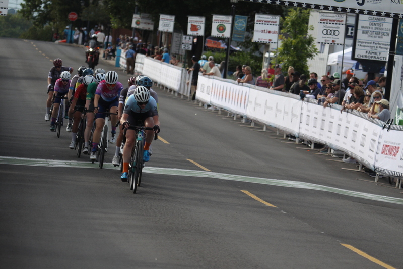 Tour de Florissant 2025 G -XVI.jpg :: Tour de Florissant 2025 - Gateway Cup 2025 - September 1st 2025 -Labor Day Weekend 2025 - Labor Day - Women's Pro CAT 1/2 - 70 minutes of racing, a field of 150 bicycle racers - Tour de Florissant - New course for 2025! The fourth and final leg of the Gateway Cup gets underway in Historic Old Town Florissant in St. Louis County. This technical course races through one of St. Louis' most nostalgic locales. Note - the course has been shifted to a flat finish in front of Historic City Hall, one mild climb, 6 turns. Gateway Cup website - Riders that have been significantly delayed (have to get off bikes, step over riders, forced detour off course to continue, etc.). May report for a free lap. Rider's reporting are subject to the decision of the officials monitoring the course to allow the free lap. - This often used in mass start race finishes with two or more categories racing.