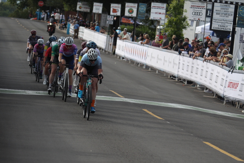 Tour de Florissant 2025 G -XVIII.jpg :: Tour de Florissant 2025 - Gateway Cup 2025 - September 1st 2025 -Labor Day Weekend 2025 - Labor Day - Women's Pro CAT 1/2 - 70 minutes of racing, a field of 150 bicycle racers - Tour de Florissant - New course for 2025! The fourth and final leg of the Gateway Cup gets underway in Historic Old Town Florissant in St. Louis County. This technical course races through one of St. Louis' most nostalgic locales. Note - the course has been shifted to a flat finish in front of Historic City Hall, one mild climb, 6 turns. Gateway Cup website - Riders that have been significantly delayed (have to get off bikes, step over riders, forced detour off course to continue, etc.). May report for a free lap. Rider's reporting are subject to the decision of the officials monitoring the course to allow the free lap. - This often used in mass start race finishes with two or more categories racing.