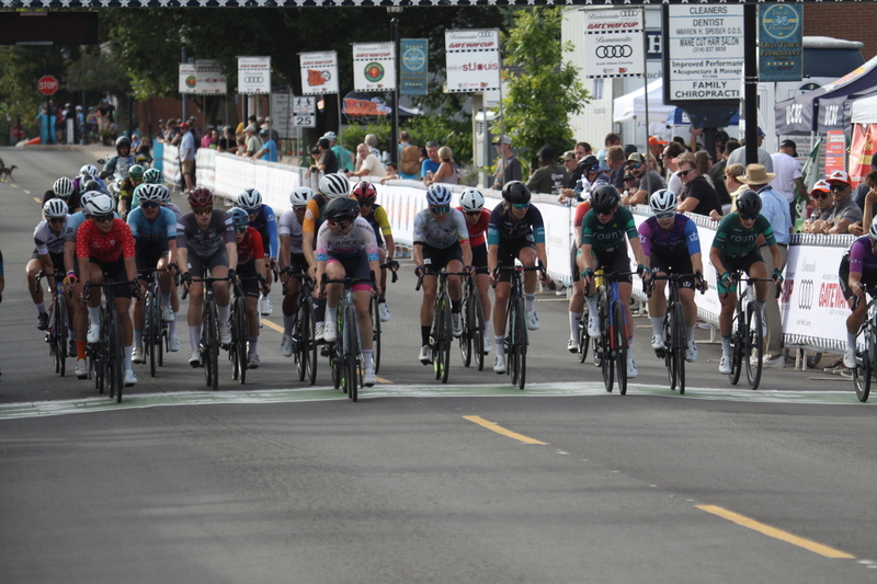 Tour de Florissant 2025 G -XXII.jpg :: Tour de Florissant 2025 - Gateway Cup 2025 - September 1st 2025 -Labor Day Weekend 2025 - Labor Day - Women's Pro CAT 1/2 - 70 minutes of racing, a field of 150 bicycle racers - Tour de Florissant - New course for 2025! The fourth and final leg of the Gateway Cup gets underway in Historic Old Town Florissant in St. Louis County. This technical course races through one of St. Louis' most nostalgic locales. Note - the course has been shifted to a flat finish in front of Historic City Hall, one mild climb, 6 turns. Gateway Cup website - Riders that have been significantly delayed (have to get off bikes, step over riders, forced detour off course to continue, etc.). May report for a free lap. Rider's reporting are subject to the decision of the officials monitoring the course to allow the free lap. - This often used in mass start race finishes with two or more categories racing.