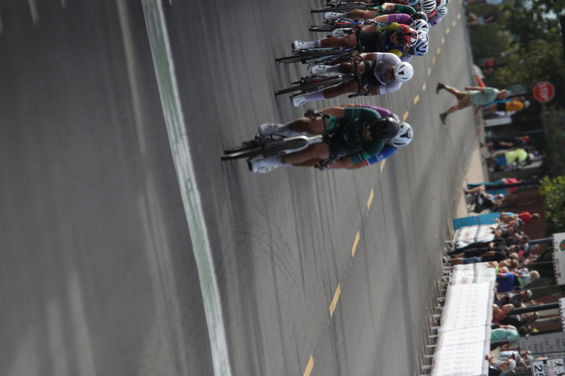 Tour de Florissant 2025 G -XXIX.jpg :: Tour de Florissant 2025 - Gateway Cup 2025 - September 1st 2025 -Labor Day Weekend 2025 - Labor Day - Women's Pro CAT 1/2 - 70 minutes of racing, a field of 150 bicycle racers - Tour de Florissant - New course for 2025! The fourth and final leg of the Gateway Cup gets underway in Historic Old Town Florissant in St. Louis County. This technical course races through one of St. Louis' most nostalgic locales. Note - the course has been shifted to a flat finish in front of Historic City Hall, one mild climb, 6 turns. Gateway Cup website - Riders that have been significantly delayed (have to get off bikes, step over riders, forced detour off course to continue, etc.). May report for a free lap. Rider's reporting are subject to the decision of the officials monitoring the course to allow the free lap. - This often used in mass start race finishes with two or more categories racing.