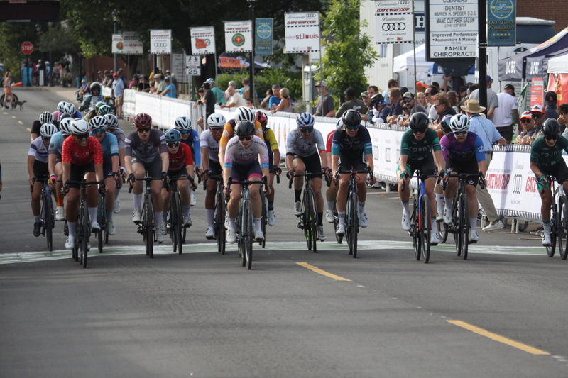 Tour de Florissant 2025 G -XXV.jpg :: Tour de Florissant 2025 - Gateway Cup 2025 - September 1st 2025 -Labor Day Weekend 2025 - Labor Day - Women's Pro CAT 1/2 - 70 minutes of racing, a field of 150 bicycle racers - Tour de Florissant - New course for 2025! The fourth and final leg of the Gateway Cup gets underway in Historic Old Town Florissant in St. Louis County. This technical course races through one of St. Louis' most nostalgic locales. Note - the course has been shifted to a flat finish in front of Historic City Hall, one mild climb, 6 turns. Gateway Cup website - Riders that have been significantly delayed (have to get off bikes, step over riders, forced detour off course to continue, etc.). May report for a free lap. Rider's reporting are subject to the decision of the officials monitoring the course to allow the free lap. - This often used in mass start race finishes with two or more categories racing.