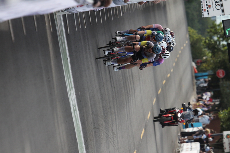 Tour de Florissant 2025 G -XXX.jpg :: Tour de Florissant 2025 - Gateway Cup 2025 - September 1st 2025 -Labor Day Weekend 2025 - Labor Day - Women's Pro CAT 1/2 - 70 minutes of racing, a field of 150 bicycle racers - Tour de Florissant - New course for 2025! The fourth and final leg of the Gateway Cup gets underway in Historic Old Town Florissant in St. Louis County. This technical course races through one of St. Louis' most nostalgic locales. Note - the course has been shifted to a flat finish in front of Historic City Hall, one mild climb, 6 turns. Gateway Cup website - Riders that have been significantly delayed (have to get off bikes, step over riders, forced detour off course to continue, etc.). May report for a free lap. Rider's reporting are subject to the decision of the officials monitoring the course to allow the free lap. - This often used in mass start race finishes with two or more categories racing.