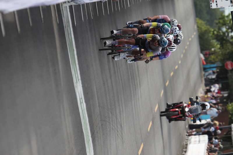 Tour de Florissant 2025 G -XXXI.jpg :: Tour de Florissant 2025 - Gateway Cup 2025 - September 1st 2025 -Labor Day Weekend 2025 - Labor Day - Women's Pro CAT 1/2 - 70 minutes of racing, a field of 150 bicycle racers - Tour de Florissant - New course for 2025! The fourth and final leg of the Gateway Cup gets underway in Historic Old Town Florissant in St. Louis County. This technical course races through one of St. Louis' most nostalgic locales. Note - the course has been shifted to a flat finish in front of Historic City Hall, one mild climb, 6 turns. Gateway Cup website - Riders that have been significantly delayed (have to get off bikes, step over riders, forced detour off course to continue, etc.). May report for a free lap. Rider's reporting are subject to the decision of the officials monitoring the course to allow the free lap. - This often used in mass start race finishes with two or more categories racing.