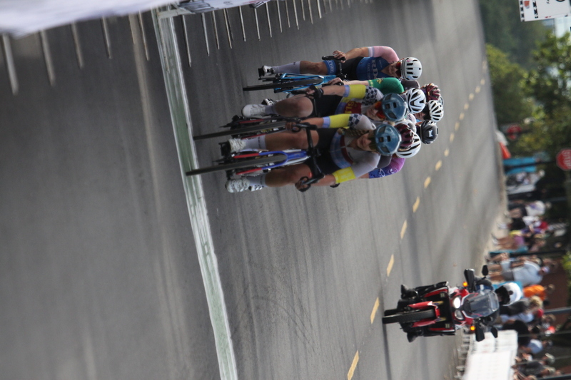 Tour de Florissant 2025 G -XXXIV.jpg :: Tour de Florissant 2025 - Gateway Cup 2025 - September 1st 2025 -Labor Day Weekend 2025 - Labor Day - Women's Pro CAT 1/2 - 70 minutes of racing, a field of 150 bicycle racers - Tour de Florissant - New course for 2025! The fourth and final leg of the Gateway Cup gets underway in Historic Old Town Florissant in St. Louis County. This technical course races through one of St. Louis' most nostalgic locales. Note - the course has been shifted to a flat finish in front of Historic City Hall, one mild climb, 6 turns. Gateway Cup website - Riders that have been significantly delayed (have to get off bikes, step over riders, forced detour off course to continue, etc.). May report for a free lap. Rider's reporting are subject to the decision of the officials monitoring the course to allow the free lap. - This often used in mass start race finishes with two or more categories racing.