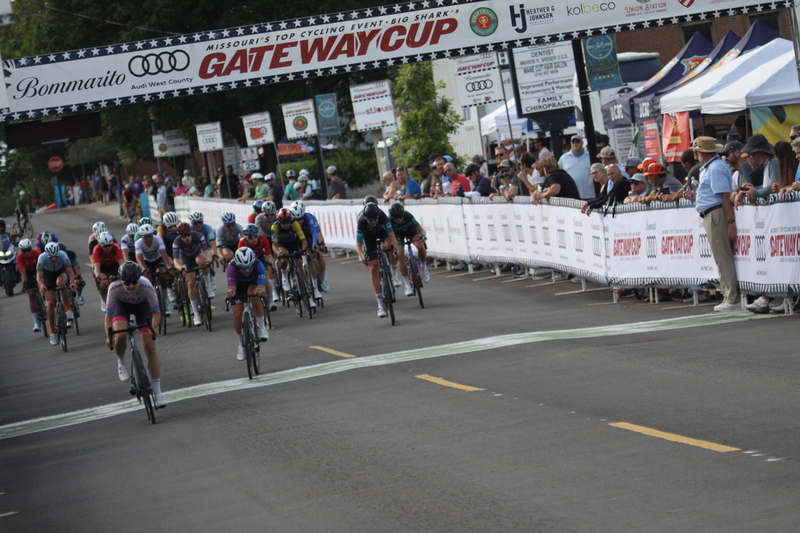 Tour de Florissant 2025 G -XXXIX.jpg :: Tour de Florissant 2025 - Gateway Cup 2025 - September 1st 2025 -Labor Day Weekend 2025 - Labor Day - Women's Pro CAT 1/2 - 70 minutes of racing, a field of 150 bicycle racers - Tour de Florissant - New course for 2025! The fourth and final leg of the Gateway Cup gets underway in Historic Old Town Florissant in St. Louis County. This technical course races through one of St. Louis' most nostalgic locales. Note - the course has been shifted to a flat finish in front of Historic City Hall, one mild climb, 6 turns. Gateway Cup website - Riders that have been significantly delayed (have to get off bikes, step over riders, forced detour off course to continue, etc.). May report for a free lap. Rider's reporting are subject to the decision of the officials monitoring the course to allow the free lap. - This often used in mass start race finishes with two or more categories racing.