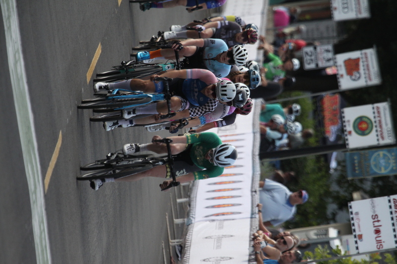 Tour de Florissant 2025 G -XXXVII.jpg :: Tour de Florissant 2025 - Gateway Cup 2025 - September 1st 2025 -Labor Day Weekend 2025 - Labor Day - Women's Pro CAT 1/2 - 70 minutes of racing, a field of 150 bicycle racers - Tour de Florissant - New course for 2025! The fourth and final leg of the Gateway Cup gets underway in Historic Old Town Florissant in St. Louis County. This technical course races through one of St. Louis' most nostalgic locales. Note - the course has been shifted to a flat finish in front of Historic City Hall, one mild climb, 6 turns. Gateway Cup website - Riders that have been significantly delayed (have to get off bikes, step over riders, forced detour off course to continue, etc.). May report for a free lap. Rider's reporting are subject to the decision of the officials monitoring the course to allow the free lap. - This often used in mass start race finishes with two or more categories racing.