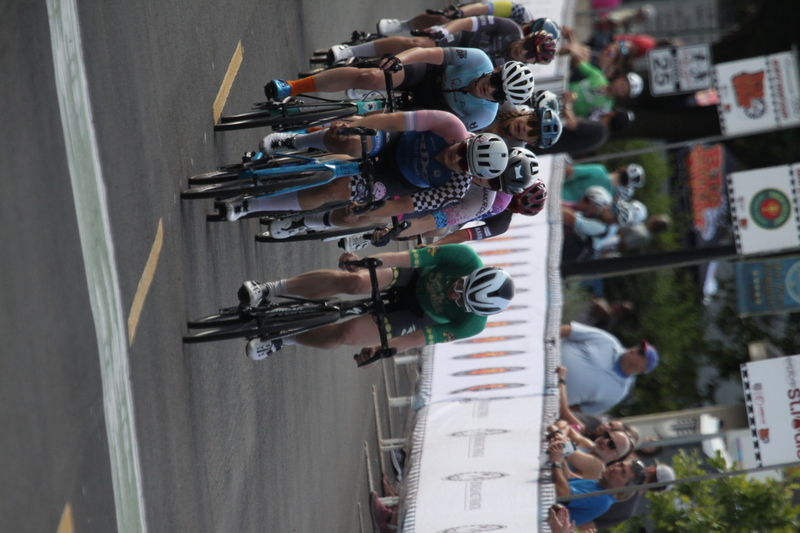 Tour de Florissant 2025 G -XXXVIII.jpg :: Tour de Florissant 2025 - Gateway Cup 2025 - September 1st 2025 -Labor Day Weekend 2025 - Labor Day - Women's Pro CAT 1/2 - 70 minutes of racing, a field of 150 bicycle racers - Tour de Florissant - New course for 2025! The fourth and final leg of the Gateway Cup gets underway in Historic Old Town Florissant in St. Louis County. This technical course races through one of St. Louis' most nostalgic locales. Note - the course has been shifted to a flat finish in front of Historic City Hall, one mild climb, 6 turns. Gateway Cup website - Riders that have been significantly delayed (have to get off bikes, step over riders, forced detour off course to continue, etc.). May report for a free lap. Rider's reporting are subject to the decision of the officials monitoring the course to allow the free lap. - This often used in mass start race finishes with two or more categories racing.