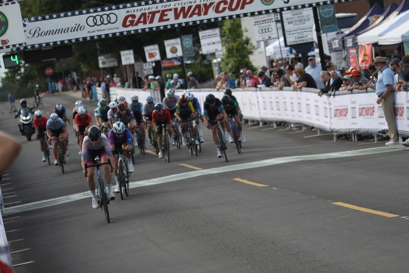 Tour de Florissant 2025 G -XXXXI.jpg :: Tour de Florissant 2025 - Gateway Cup 2025 - September 1st 2025 -Labor Day Weekend 2025 - Labor Day - Women's Pro CAT 1/2 - 70 minutes of racing, a field of 150 bicycle racers - Tour de Florissant - New course for 2025! The fourth and final leg of the Gateway Cup gets underway in Historic Old Town Florissant in St. Louis County. This technical course races through one of St. Louis' most nostalgic locales. Note - the course has been shifted to a flat finish in front of Historic City Hall, one mild climb, 6 turns. Gateway Cup website - Riders that have been significantly delayed (have to get off bikes, step over riders, forced detour off course to continue, etc.). May report for a free lap. Rider's reporting are subject to the decision of the officials monitoring the course to allow the free lap. - This often used in mass start race finishes with two or more categories racing.