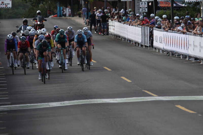 Tour de Florissant 2025 G -XXXXVI.jpg :: Tour de Florissant 2025 - Gateway Cup 2025 - September 1st 2025 -Labor Day Weekend 2025 - Labor Day - Women's Pro CAT 1/2 - 70 minutes of racing, a field of 150 bicycle racers - Tour de Florissant - New course for 2025! The fourth and final leg of the Gateway Cup gets underway in Historic Old Town Florissant in St. Louis County. This technical course races through one of St. Louis' most nostalgic locales. Note - the course has been shifted to a flat finish in front of Historic City Hall, one mild climb, 6 turns. Gateway Cup website - Riders that have been significantly delayed (have to get off bikes, step over riders, forced detour off course to continue, etc.). May report for a free lap. Rider's reporting are subject to the decision of the officials monitoring the course to allow the free lap. - This often used in mass start race finishes with two or more categories racing.