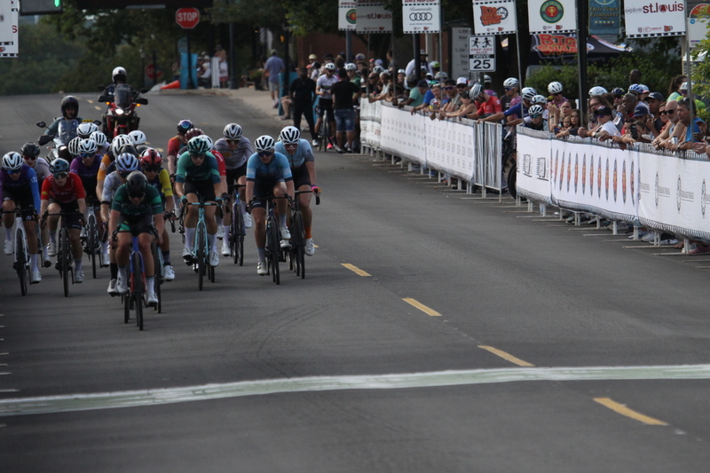 Tour de Florissant 2025 G -XXXXVII.jpg :: Tour de Florissant 2025 - Gateway Cup 2025 - September 1st 2025 -Labor Day Weekend 2025 - Labor Day - Women's Pro CAT 1/2 - 70 minutes of racing, a field of 150 bicycle racers - Tour de Florissant - New course for 2025! The fourth and final leg of the Gateway Cup gets underway in Historic Old Town Florissant in St. Louis County. This technical course races through one of St. Louis' most nostalgic locales. Note - the course has been shifted to a flat finish in front of Historic City Hall, one mild climb, 6 turns. Gateway Cup website - Riders that have been significantly delayed (have to get off bikes, step over riders, forced detour off course to continue, etc.). May report for a free lap. Rider's reporting are subject to the decision of the officials monitoring the course to allow the free lap. - This often used in mass start race finishes with two or more categories racing.
