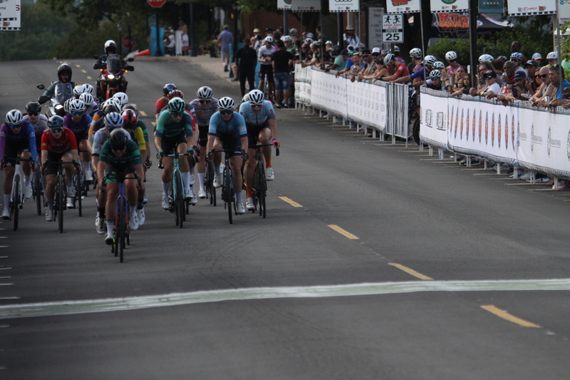 Tour de Florissant 2025 G -XXXXVIII.jpg :: Tour de Florissant 2025 - Gateway Cup 2025 - September 1st 2025 -Labor Day Weekend 2025 - Labor Day - Women's Pro CAT 1/2 - 70 minutes of racing, a field of 150 bicycle racers - Tour de Florissant - New course for 2025! The fourth and final leg of the Gateway Cup gets underway in Historic Old Town Florissant in St. Louis County. This technical course races through one of St. Louis' most nostalgic locales. Note - the course has been shifted to a flat finish in front of Historic City Hall, one mild climb, 6 turns. Gateway Cup website - Riders that have been significantly delayed (have to get off bikes, step over riders, forced detour off course to continue, etc.). May report for a free lap. Rider's reporting are subject to the decision of the officials monitoring the course to allow the free lap. - This often used in mass start race finishes with two or more categories racing.