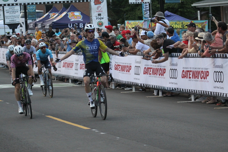 Tour de Florissant 2025 H -LXXII.jpg :: Tour de Florissant 2025 - Gateway Cup 2025 - Men's Pro CAT 1 - 70 Minutes of Racing - 150 rider field - Tour de Florissant - New course for 2025! The fourth and final leg of the Gateway Cup gets underway in Historic Old Town Florissant in St. Louis County. This course races through one of St. Louis' most nostalgic locales. Note - the course has been shifted to a flat finish in front of Historic City Hall, one mild climb, 6 turns. USA Cycling, Men's Pro Cycling, In mass start cycling races, the winner is determined by the first rider to cross the finish line. However, the race format can vary, and some events may have additional criteria or rules that can influence the winner. For example, in points races, the rider with the most points at the end of the race wins, and in sprint events, the winner is determined by the third rider to cross the finish line after a series of sprints.   