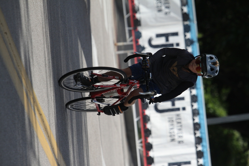 Tour de Florissant 2025 XXVII.jpg :: Tour de Florissant 2025/Gateway Cup 2025 - Juniors B (9-12 13-14)25 minutes of racing - Tour de Florissant - New course for 2025! - The fourth and final leg of the Gateway Cup gets underway in Historic Old Town Florissant in St. Louis County. This technical course races through one of St. Louis' most nostalgic locales. Note - the course has been shifted to a flat finish in front of Historic City Hall, one mild climb, 6 turns. - Category Novice (CAT NOV) This is the entry-level category for beginners. Races are shorter and less challenging to help new riders develop their skills and enjoy the sport. USA Cycling.