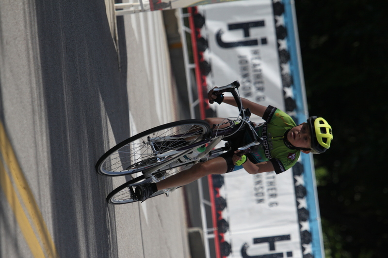 Tour de Florissant 2025 XXXIV.jpg :: Tour de Florissant 2025/Gateway Cup 2025 - Juniors B (9-12 13-14)25 minutes of racing - Tour de Florissant - New course for 2025! - The fourth and final leg of the Gateway Cup gets underway in Historic Old Town Florissant in St. Louis County. This technical course races through one of St. Louis' most nostalgic locales. Note - the course has been shifted to a flat finish in front of Historic City Hall, one mild climb, 6 turns. - Category Novice (CAT NOV) This is the entry-level category for beginners. Races are shorter and less challenging to help new riders develop their skills and enjoy the sport. USA Cycling.