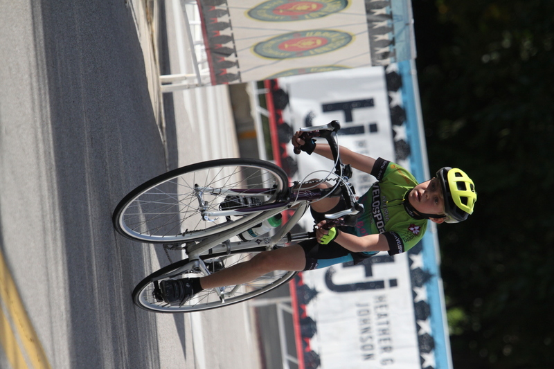 Tour de Florissant 2025 XXXV.jpg :: Tour de Florissant 2025/Gateway Cup 2025 - Juniors B (9-12 13-14)25 minutes of racing - Tour de Florissant - New course for 2025! - The fourth and final leg of the Gateway Cup gets underway in Historic Old Town Florissant in St. Louis County. This technical course races through one of St. Louis' most nostalgic locales. Note - the course has been shifted to a flat finish in front of Historic City Hall, one mild climb, 6 turns. - Category Novice (CAT NOV) This is the entry-level category for beginners. Races are shorter and less challenging to help new riders develop their skills and enjoy the sport. USA Cycling.