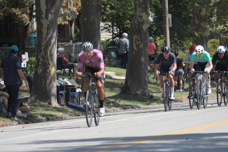 Tour de Francis Park 2025 A -CIX.jpg :: Tour de Francis Park 2025, Gateway Cup 2025, Men's CAT 3/4 50 minutes, Tour de Francis Park! Francis Park, named after David Rowland Francis - President of the Louisiana Purchase Exposition (the 1904 World's Fair) is known for its wide, tree lined streets and for having beautiful churches on every corner. Today the St. Louis Hills neighborhood showcases gingerbread bungalows, stately homes and some of the tidiest landscaping in St. Louis. - Gateway Cup website - Peloton -in a bicycle race, the term -Peloton- refers to the main of riders, also known as the -pack- or -bunch.- Riders race in a pack to draft, which means they ride closely together to save energy and improve speed. USA Cycling  