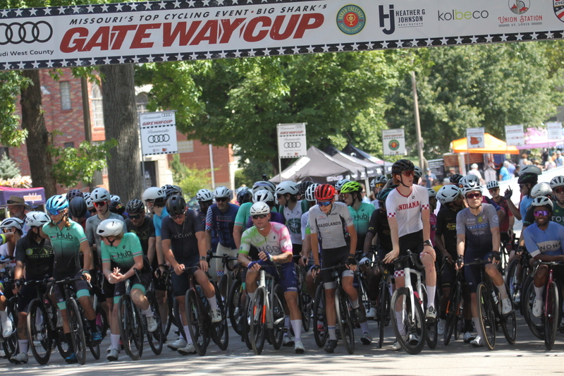 Tour de Francis Park 2025 A -CVII.jpg :: Tour de Francis Park 2025, Gateway Cup 2025, Men's CAT 3/4 50 minutes, Tour de Francis Park! Francis Park, named after David Rowland Francis - President of the Louisiana Purchase Exposition (the 1904 World's Fair) is known for its wide, tree lined streets and for having beautiful churches on every corner. Today the St. Louis Hills neighborhood showcases gingerbread bungalows, stately homes and some of the tidiest landscaping in St. Louis. - Gateway Cup website - Peloton -in a bicycle race, the term -Peloton- refers to the main of riders, also known as the -pack- or -bunch.- Riders race in a pack to draft, which means they ride closely together to save energy and improve speed. USA Cycling  