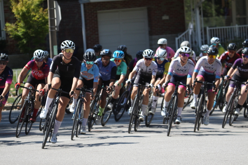 Tour de Francis Park 2025 A -XIV.jpg :: Tour de Francis Park 2025/Gateway Cup 2025 - Women 3/4/5 & Women's 40+ 1230pm 40 minutes - Tour de Francis Park! Francis Park, named after David Rowland Francis - President of the Louisiana Purchase Exposition (the 1904 World's Fair) is known for its wide, tree lined streets and for having beautiful churches on every corner. Today the St. Louis Hills neighborhood showcases gingerbread bungalows, stately homes and some of the tidiest landscaping in St. Louis, Missouri, USA - Peloton - in a bicycle race, the term PELOTON refers to the main group of riders, also known as the PACK or BUNCH. Riders race in a pack to draft, which means they ride closely together to save energy and improve speed. 