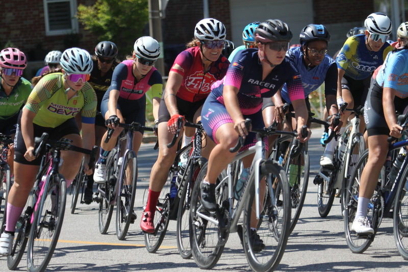 Tour de Francis Park 2025 A -XIX.jpg :: Tour de Francis Park 2025/Gateway Cup 2025 - Women 3/4/5 & Women's 40+ 1230pm 40 minutes - Tour de Francis Park! Francis Park, named after David Rowland Francis - President of the Louisiana Purchase Exposition (the 1904 World's Fair) is known for its wide, tree lined streets and for having beautiful churches on every corner. Today the St. Louis Hills neighborhood showcases gingerbread bungalows, stately homes and some of the tidiest landscaping in St. Louis, Missouri, USA - Peloton - in a bicycle race, the term PELOTON refers to the main group of riders, also known as the PACK or BUNCH. Riders race in a pack to draft, which means they ride closely together to save energy and improve speed. 