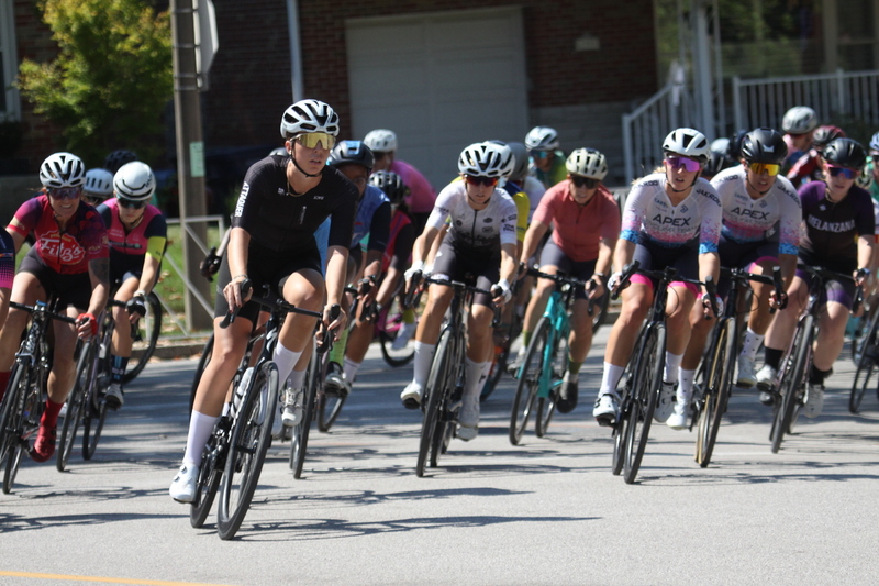 Tour de Francis Park 2025 A -XVI.jpg :: Tour de Francis Park 2025/Gateway Cup 2025 - Women 3/4/5 & Women's 40+ 1230pm 40 minutes - Tour de Francis Park! Francis Park, named after David Rowland Francis - President of the Louisiana Purchase Exposition (the 1904 World's Fair) is known for its wide, tree lined streets and for having beautiful churches on every corner. Today the St. Louis Hills neighborhood showcases gingerbread bungalows, stately homes and some of the tidiest landscaping in St. Louis, Missouri, USA - Peloton - in a bicycle race, the term PELOTON refers to the main group of riders, also known as the PACK or BUNCH. Riders race in a pack to draft, which means they ride closely together to save energy and improve speed. 