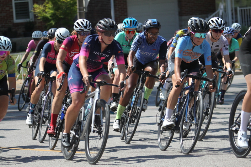 Tour de Francis Park 2025 A -XVIII.jpg :: Tour de Francis Park 2025/Gateway Cup 2025 - Women 3/4/5 & Women's 40+ 1230pm 40 minutes - Tour de Francis Park! Francis Park, named after David Rowland Francis - President of the Louisiana Purchase Exposition (the 1904 World's Fair) is known for its wide, tree lined streets and for having beautiful churches on every corner. Today the St. Louis Hills neighborhood showcases gingerbread bungalows, stately homes and some of the tidiest landscaping in St. Louis, Missouri, USA - Peloton - in a bicycle race, the term PELOTON refers to the main group of riders, also known as the PACK or BUNCH. Riders race in a pack to draft, which means they ride closely together to save energy and improve speed. 