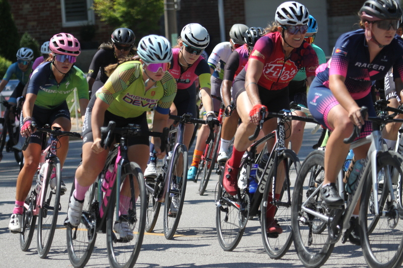 Tour de Francis Park 2025 A -XX.jpg :: Tour de Francis Park 2025/Gateway Cup 2025 - Women 3/4/5 & Women's 40+ 1230pm 40 minutes - Tour de Francis Park! Francis Park, named after David Rowland Francis - President of the Louisiana Purchase Exposition (the 1904 World's Fair) is known for its wide, tree lined streets and for having beautiful churches on every corner. Today the St. Louis Hills neighborhood showcases gingerbread bungalows, stately homes and some of the tidiest landscaping in St. Louis, Missouri, USA - Peloton - in a bicycle race, the term PELOTON refers to the main group of riders, also known as the PACK or BUNCH. Riders race in a pack to draft, which means they ride closely together to save energy and improve speed. 