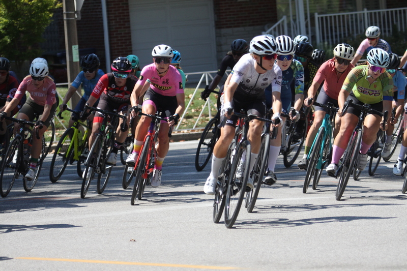 Tour de Francis Park 2025 A -XXIV.jpg :: Tour de Francis Park 2025/Gateway Cup 2025 - Women 3/4/5 & Women's 40+ 1230pm 40 minutes - Tour de Francis Park! Francis Park, named after David Rowland Francis - President of the Louisiana Purchase Exposition (the 1904 World's Fair) is known for its wide, tree lined streets and for having beautiful churches on every corner. Today the St. Louis Hills neighborhood showcases gingerbread bungalows, stately homes and some of the tidiest landscaping in St. Louis, Missouri, USA - Peloton - in a bicycle race, the term PELOTON refers to the main group of riders, also known as the PACK or BUNCH. Riders race in a pack to draft, which means they ride closely together to save energy and improve speed. 