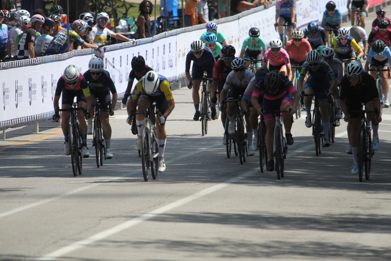 Tour de Francis Park 2025 A -XXXXI.jpg :: Tour de Francis Park 2025/Gateway Cup 2025 - Women 3/4/5 & Women's 40+ 1230pm 40 minutes - Tour de Francis Park! Francis Park, named after David Rowland Francis - President of the Louisiana Purchase Exposition (the 1904 World's Fair) is known for its wide, tree lined streets and for having beautiful churches on every corner. Today the St. Louis Hills neighborhood showcases gingerbread bungalows, stately homes and some of the tidiest landscaping in St. Louis, Missouri, USA - Peloton - in a bicycle race, the term PELOTON refers to the main group of riders, also known as the PACK or BUNCH. Riders race in a pack to draft, which means they ride closely together to save energy and improve speed. 