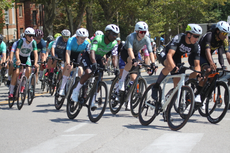 Tour de Francis Park 2025 B -.jpg :: Tour de Francis Park 2025, Gateway Cup 2025, Men's CAT 3/4 50 minutes, Tour de Francis Park! Francis Park, named after David Rowland Francis - President of the Louisiana Purchase Exposition (the 1904 World's Fair) is known for its wide, tree lined streets and for having beautiful churches on every corner. Today the St. Louis Hills neighborhood showcases gingerbread bungalows, stately homes and some of the tidiest landscaping in St. Louis. - Gateway Cup website - Peloton -in a bicycle race, the term -Peloton- refers to the main of riders, also known as the -pack- or -bunch.- Riders race in a pack to draft, which means they ride closely together to save energy and improve speed. USA Cycling  