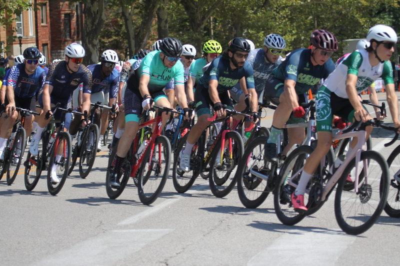 Tour de Francis Park 2025 B -II.jpg :: Tour de Francis Park 2025, Gateway Cup 2025, Men's CAT 3/4 50 minutes, Tour de Francis Park! Francis Park, named after David Rowland Francis - President of the Louisiana Purchase Exposition (the 1904 World's Fair) is known for its wide, tree lined streets and for having beautiful churches on every corner. Today the St. Louis Hills neighborhood showcases gingerbread bungalows, stately homes and some of the tidiest landscaping in St. Louis. - Gateway Cup website - Peloton -in a bicycle race, the term -Peloton- refers to the main of riders, also known as the -pack- or -bunch.- Riders race in a pack to draft, which means they ride closely together to save energy and improve speed. USA Cycling  