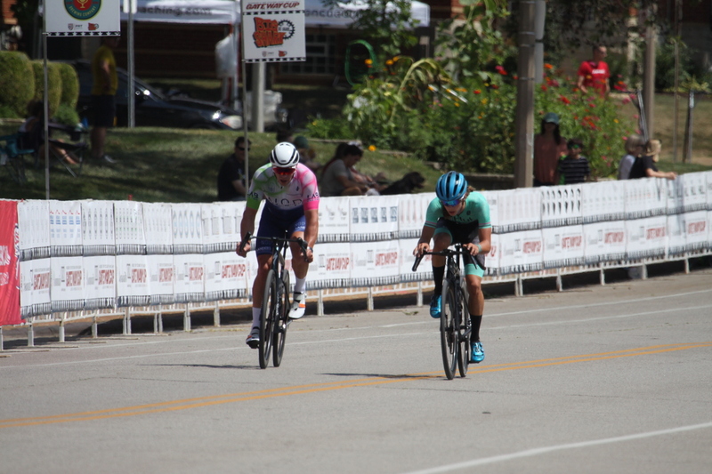 Tour de Francis Park 2025 B -IX.jpg :: Tour de Francis Park 2025, Gateway Cup 2025, Men's CAT 3/4 50 minutes, Tour de Francis Park! Francis Park, named after David Rowland Francis - President of the Louisiana Purchase Exposition (the 1904 World's Fair) is known for its wide, tree lined streets and for having beautiful churches on every corner. Today the St. Louis Hills neighborhood showcases gingerbread bungalows, stately homes and some of the tidiest landscaping in St. Louis. - Gateway Cup website - Peloton -in a bicycle race, the term -Peloton- refers to the main of riders, also known as the -pack- or -bunch.- Riders race in a pack to draft, which means they ride closely together to save energy and improve speed. USA Cycling  