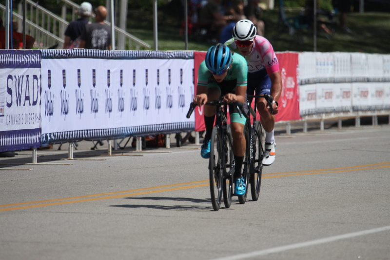 Tour de Francis Park 2025 B -XI.jpg :: Tour de Francis Park 2025, Gateway Cup 2025, Men's CAT 3/4 50 minutes, Tour de Francis Park! Francis Park, named after David Rowland Francis - President of the Louisiana Purchase Exposition (the 1904 World's Fair) is known for its wide, tree lined streets and for having beautiful churches on every corner. Today the St. Louis Hills neighborhood showcases gingerbread bungalows, stately homes and some of the tidiest landscaping in St. Louis. - Gateway Cup website - Peloton -in a bicycle race, the term -Peloton- refers to the main of riders, also known as the -pack- or -bunch.- Riders race in a pack to draft, which means they ride closely together to save energy and improve speed. USA Cycling  