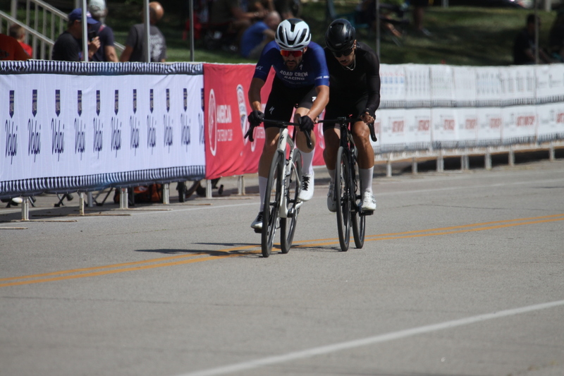 Tour de Francis Park 2025 B -XIV.jpg :: Tour de Francis Park 2025, Gateway Cup 2025, Men's CAT 3/4 50 minutes, Tour de Francis Park! Francis Park, named after David Rowland Francis - President of the Louisiana Purchase Exposition (the 1904 World's Fair) is known for its wide, tree lined streets and for having beautiful churches on every corner. Today the St. Louis Hills neighborhood showcases gingerbread bungalows, stately homes and some of the tidiest landscaping in St. Louis. - Gateway Cup website - Peloton -in a bicycle race, the term -Peloton- refers to the main of riders, also known as the -pack- or -bunch.- Riders race in a pack to draft, which means they ride closely together to save energy and improve speed. USA Cycling  