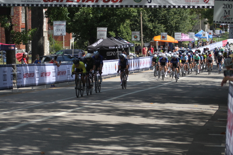 Tour de Francis Park 2025 B -XIX.jpg :: Tour de Francis Park 2025, Gateway Cup 2025, Men's CAT 3/4 50 minutes, Tour de Francis Park! Francis Park, named after David Rowland Francis - President of the Louisiana Purchase Exposition (the 1904 World's Fair) is known for its wide, tree lined streets and for having beautiful churches on every corner. Today the St. Louis Hills neighborhood showcases gingerbread bungalows, stately homes and some of the tidiest landscaping in St. Louis. - Gateway Cup website - Peloton -in a bicycle race, the term -Peloton- refers to the main of riders, also known as the -pack- or -bunch.- Riders race in a pack to draft, which means they ride closely together to save energy and improve speed. USA Cycling  