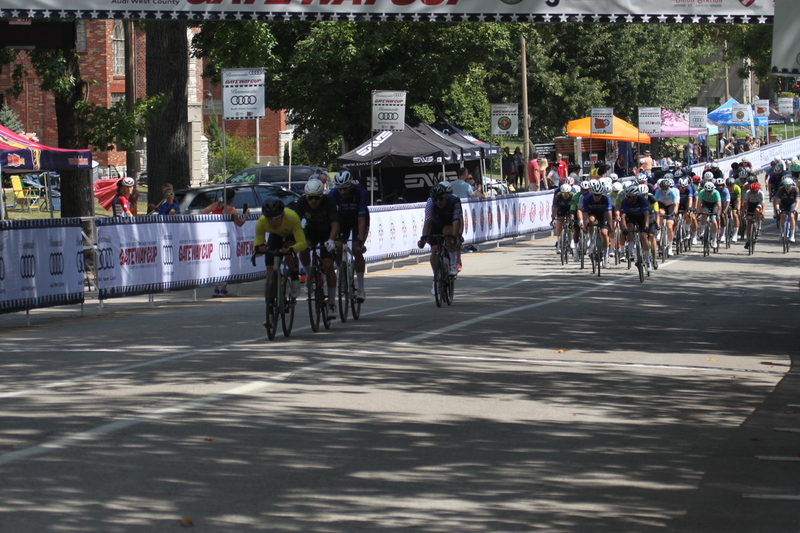 Tour de Francis Park 2025 B -XX.jpg :: Tour de Francis Park 2025, Gateway Cup 2025, Men's CAT 3/4 50 minutes, Tour de Francis Park! Francis Park, named after David Rowland Francis - President of the Louisiana Purchase Exposition (the 1904 World's Fair) is known for its wide, tree lined streets and for having beautiful churches on every corner. Today the St. Louis Hills neighborhood showcases gingerbread bungalows, stately homes and some of the tidiest landscaping in St. Louis. - Gateway Cup website - Peloton -in a bicycle race, the term -Peloton- refers to the main of riders, also known as the -pack- or -bunch.- Riders race in a pack to draft, which means they ride closely together to save energy and improve speed. USA Cycling  