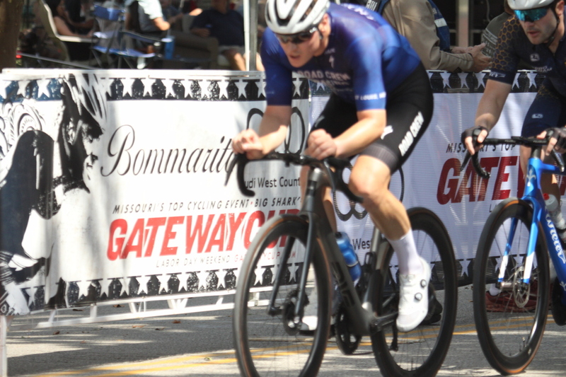 Tour de Francis Park 2025 B -XXVII.jpg :: Tour de Francis Park 2025, Gateway Cup 2025, Men's CAT 3/4 50 minutes, Tour de Francis Park! Francis Park, named after David Rowland Francis - President of the Louisiana Purchase Exposition (the 1904 World's Fair) is known for its wide, tree lined streets and for having beautiful churches on every corner. Today the St. Louis Hills neighborhood showcases gingerbread bungalows, stately homes and some of the tidiest landscaping in St. Louis. - Gateway Cup website - Peloton -in a bicycle race, the term -Peloton- refers to the main of riders, also known as the -pack- or -bunch.- Riders race in a pack to draft, which means they ride closely together to save energy and improve speed. USA Cycling  