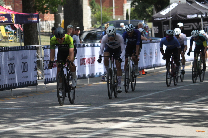 Tour de Francis Park 2025 B -XXVIII.jpg :: Tour de Francis Park 2025, Gateway Cup 2025, Men's CAT 3/4 50 minutes, Tour de Francis Park! Francis Park, named after David Rowland Francis - President of the Louisiana Purchase Exposition (the 1904 World's Fair) is known for its wide, tree lined streets and for having beautiful churches on every corner. Today the St. Louis Hills neighborhood showcases gingerbread bungalows, stately homes and some of the tidiest landscaping in St. Louis. - Gateway Cup website - Peloton -in a bicycle race, the term -Peloton- refers to the main of riders, also known as the -pack- or -bunch.- Riders race in a pack to draft, which means they ride closely together to save energy and improve speed. USA Cycling  
