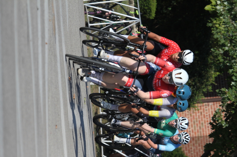 Tour de Francis Park 2025 C -LXXXXIX.jpg :: Tour de Francis Park 2025/Gateway Cup 2025 - Women's Pro CAT 1/2 70 Minutes of racing - Tour de Francis Park! Francis Park, named after David Rowland Francis - President of the Louisiana Purchase Exposition (the 1904 World's Fair) is known for its wide tree lined streets and for having beautiful churches on every corner. Today the St. Louis Hills neighborhood Showcases gingerbread bungalows, stately homes and some of the tidiest landscaping in St. Louis. - Gateway Cup Website - Riders that have been significantly delayed (have to get off bikes, step overriders, forced detour off course to continue, etc.) may report for a free lap. Rider's reporting are subject to the decision of the officials monitoring the course to allow the free lap. (web) Riders no longer have a free lap with four laps to the finish. Riders not on pace will be removed with four laps to the finish. This will remove slower riders not on lead lap and clear the course for riders sprinting for position. 