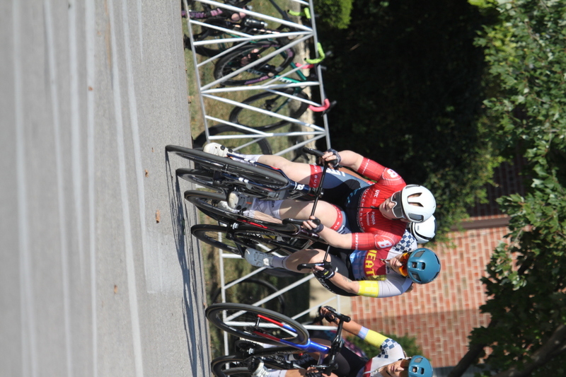 Tour de Francis Park 2025 C -LXXXXVII.jpg :: Tour de Francis Park 2025/Gateway Cup 2025 - Women's Pro CAT 1/2 70 Minutes of racing - Tour de Francis Park! Francis Park, named after David Rowland Francis - President of the Louisiana Purchase Exposition (the 1904 World's Fair) is known for its wide tree lined streets and for having beautiful churches on every corner. Today the St. Louis Hills neighborhood Showcases gingerbread bungalows, stately homes and some of the tidiest landscaping in St. Louis. - Gateway Cup Website - Riders that have been significantly delayed (have to get off bikes, step overriders, forced detour off course to continue, etc.) may report for a free lap. Rider's reporting are subject to the decision of the officials monitoring the course to allow the free lap. (web) Riders no longer have a free lap with four laps to the finish. Riders not on pace will be removed with four laps to the finish. This will remove slower riders not on lead lap and clear the course for riders sprinting for position. 
