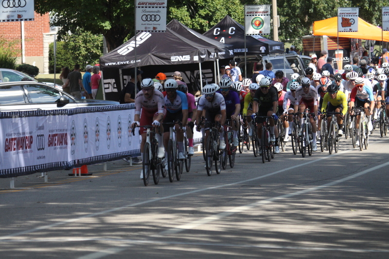 Tour de Francis Park 2025 C -XXXV.jpg :: Tour de Francis Park 2025/Gateway Cup 2025 - Men's CAT 2/3 55 Minutes of Racing - Tour de Francis Park! Francis Park, named after David Rowland Francis - President of the Louisiana Purchase Exposition (the 1904 World's Fair) is known for its wide tree lined streets and for having beautiful churches on every corner. Today the St. Louis Hills neighborhood showcases gingerbread bungalows, stately homes and some of the tidiest landscaping in St. Louis. -Gateway Cup website- Omnium -a multiple race event in track cycling. In recent years, road racing has also adopted the term to describe multi-day races that feature three primary road races events (time trial, mass start, and criterium). USA Cycling 