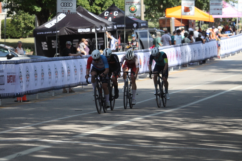 Tour de Francis Park 2025 C -XXXVII.jpg :: Tour de Francis Park 2025/Gateway Cup 2025 - Men's CAT 2/3 55 Minutes of Racing - Tour de Francis Park! Francis Park, named after David Rowland Francis - President of the Louisiana Purchase Exposition (the 1904 World's Fair) is known for its wide tree lined streets and for having beautiful churches on every corner. Today the St. Louis Hills neighborhood showcases gingerbread bungalows, stately homes and some of the tidiest landscaping in St. Louis. -Gateway Cup website- Omnium -a multiple race event in track cycling. In recent years, road racing has also adopted the term to describe multi-day races that feature three primary road races events (time trial, mass start, and criterium). USA Cycling 