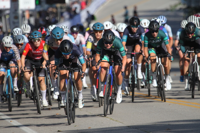 Tour de Francis Park 2025 D -XXXIV.jpg :: Tour de Francis Park 2025/Gateway Cup 2025 - Women's Pro 1/2 70 Minutes of racing - Fast, Wide, Smooth, and FAST, the Tour de Francis Park is a series favorite. This long 1.2-mile course, is full throttle-feature one super-fast downhill Turn 2 that sets up a long uphill drag to the finish. -Gateway Cup webpage - A criterium, or crit, is a bike race consisting of several laps around a closed circuit, the length of each lap or ranging from about 400 meters to 10,000 meters. (Criterium webpage)