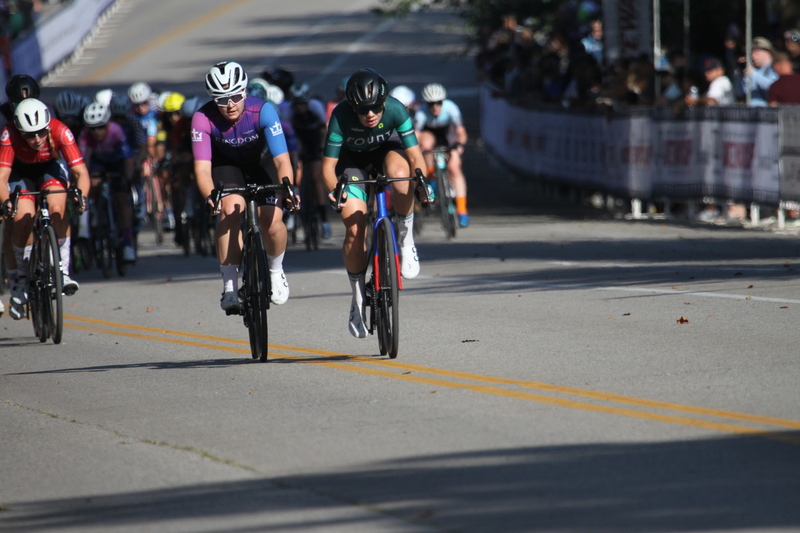 Tour de Francis Park 2025 D -XXXX.jpg :: Tour de Francis Park 2025/Gateway Cup 2025 - Women's Pro 1/2 70 Minutes of racing - Fast, Wide, Smooth, and FAST, the Tour de Francis Park is a series favorite. This long 1.2-mile course, is full throttle-feature one super-fast downhill Turn 2 that sets up a long uphill drag to the finish. -Gateway Cup webpage - A criterium, or crit, is a bike race consisting of several laps around a closed circuit, the length of each lap or ranging from about 400 meters to 10,000 meters. (Criterium webpage)