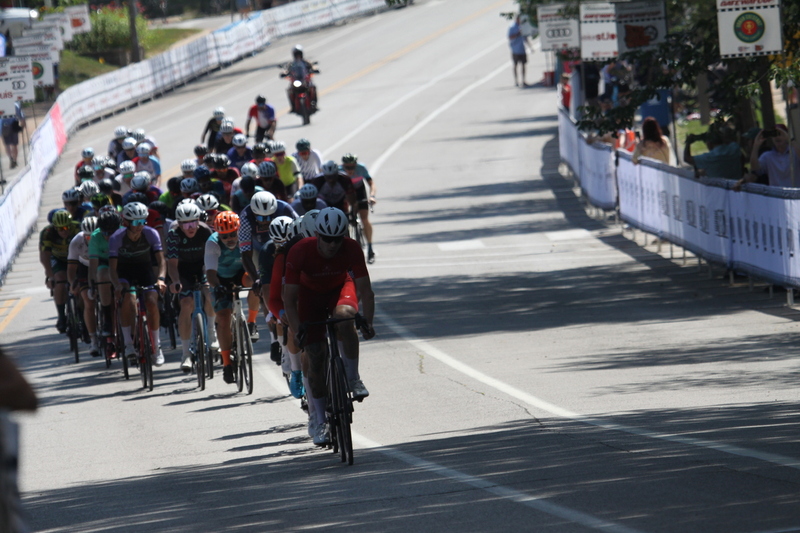 Tour de Francis Park 2025 LXXXIV.jpg :: Tour de Francis Park 2025/Gateway Cup 2025 - Men's CAT 4/5 40 Minute race 1105am - Tour de Francis Park! Francis Park, named after David Rowland Francis - President of the Louisiana Purchase Exposition (the 1904 World's Fair) is known for its wide, tree lined streets and for having beautiful churches on every corner. Today the St. Louis Hills neighborhood showcases gingerbread bungalows, stately homes and some of the tidiest landscaping in St. Louis. Gateway Cup Website- St. Louis hosts the Labor Day Omnium - Omnium - a multiple race event in track cycling. In recent years, road racing has also adopted the term to describe multi-day races that feature three primary road races events (time trial, mass start, and criterium).  USA Cycling
