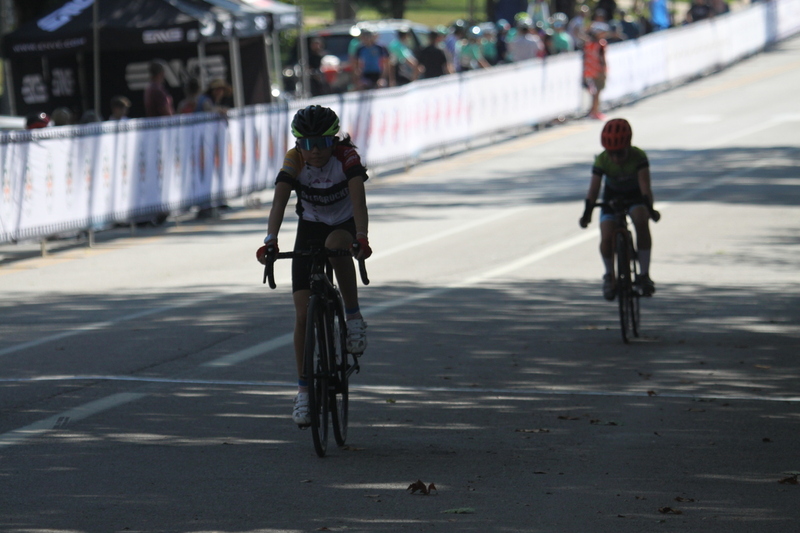 Tour de Francis Park 2025 XXV.jpg :: Tour de Francis Park 2025/Gateway Cup 2025 Juniors B (9-12, 13-14) 1015am 25 minutes, Tour de Francis Park! Francis Park, Namaed after David Rowland Francis-President of the Louisiana Purchase Exposition (the 1904 World's Fair) is known for it's wide, tree lined streets and for having beautiful churches on every corner. Today the St. Louis Hills Neighborhood shocases Gingerbread bungalows, stately homes and some of the tidiest landscaping in the St. Louis. USA Cycling