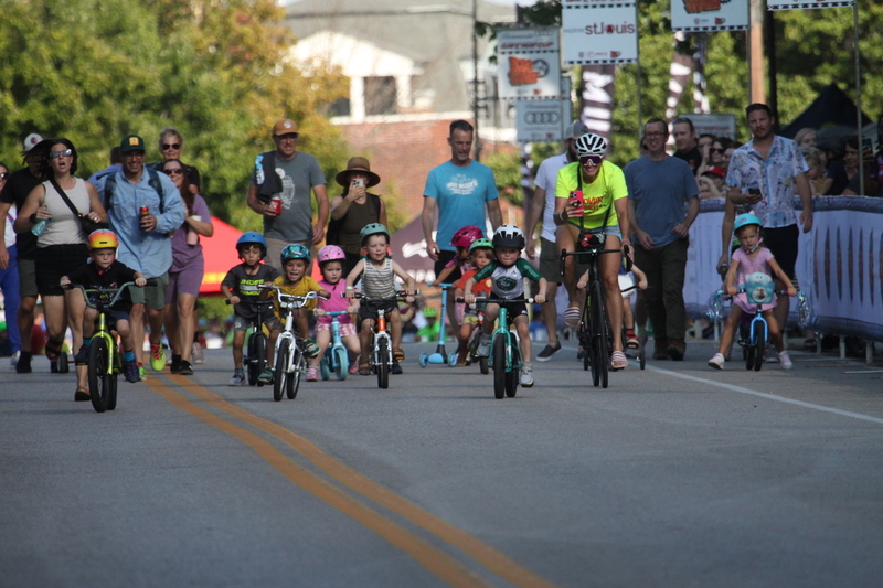 Tour de Lafayette 2025 B -XXIII.jpg :: Tour de Lafayette 2025/Gateway Cup 2025 at Lafayette Square Park in South St. Louis City, Missouri USA. There is a break in the adult racing for the kid's sprints. The races start with tricycles and Big Wheels and end with 12- and 13-year-olds. Some of these kids are the future of Criterium and Road cycling. USA Cycling. 