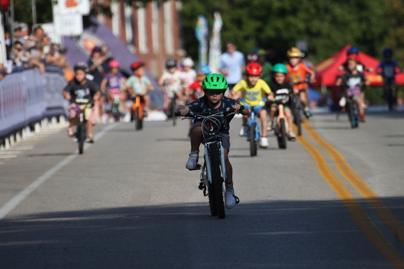 Tour de Lafayette 2025 B -XXVI.jpg :: Tour de Lafayette 2025/Gateway Cup 2025 at Lafayette Square Park in South St. Louis City, Missouri USA. There is a break in the adult racing for the kid's sprints. The races start with tricycles and Big Wheels and end with 12- and 13-year-olds. Some of these kids are the future of Criterium and Road cycling. USA Cycling. 