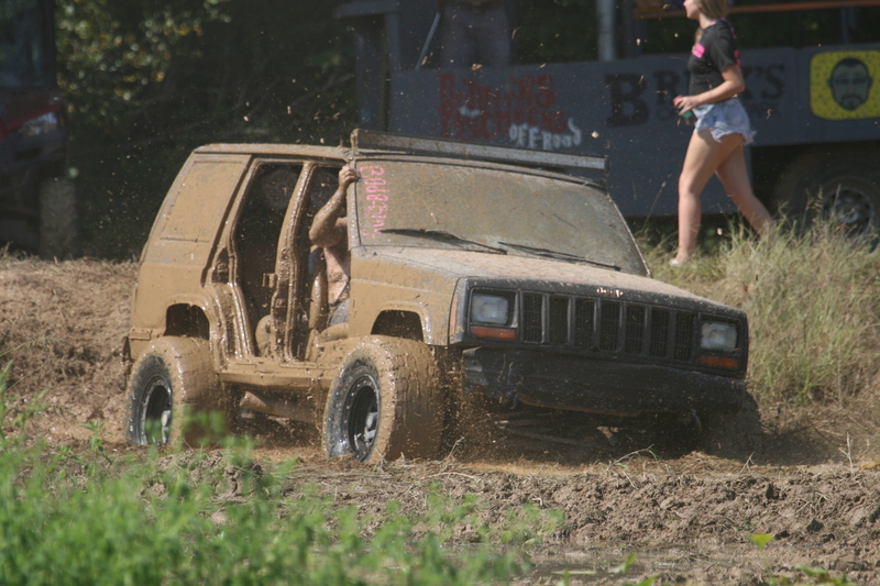 Trucks Gone Wild 2023 A -L.jpg :: Four Wheel Drivinin' off roading at Brick's Off Road Park in Poplar Bluff, Missouri, USA. Trucks Gone Wild 2023 is one of the biggest events at the Off Road Park. The friendly park goers made sure I had a few great photographs before I left. Brad pulled up in his John Deere 4x4 that looked like it could get any vehicle un-stuck to see if everything was ok. I handed him a business card and assured him that all was well. I explained that I had been at the park with Brad Pitt and Matt Damon with my kids 20 years ago. We had fun then also I had another photo shut to get to that weekend and headed to Alton, Virginia, USA. Darren at Brick's Off Road Park in Poplar Bluff, Missouri, USA.  